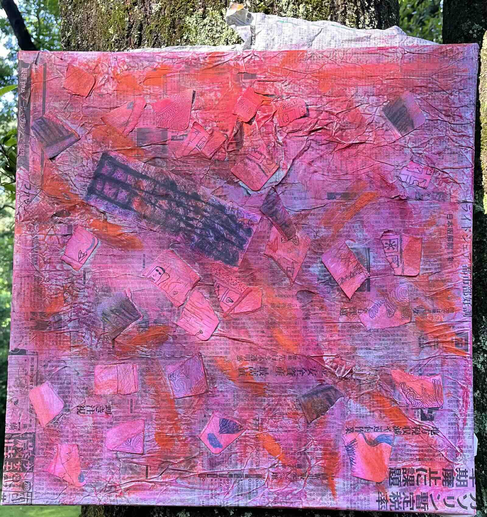 Painting over the layered collage