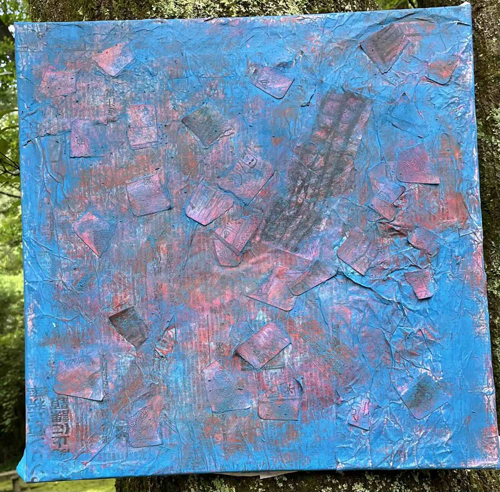 Detail of the finished collage showing texture and hidden layers